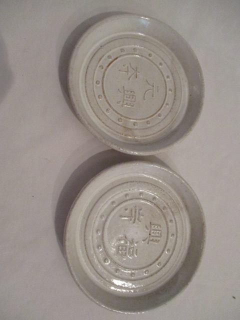 Set of Seven Small Japanese Pottery Plates Depicting the Major Temple Kiln Locations