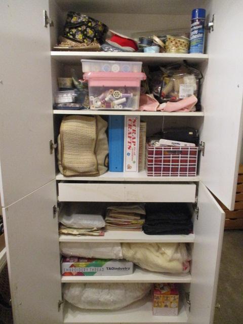 Sewing and Needlework Supplies and Storage Cabinet