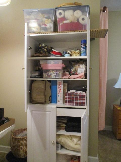 Sewing and Needlework Supplies and Storage Cabinet