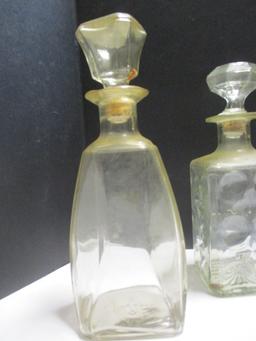 Four Clear Glass Decanters