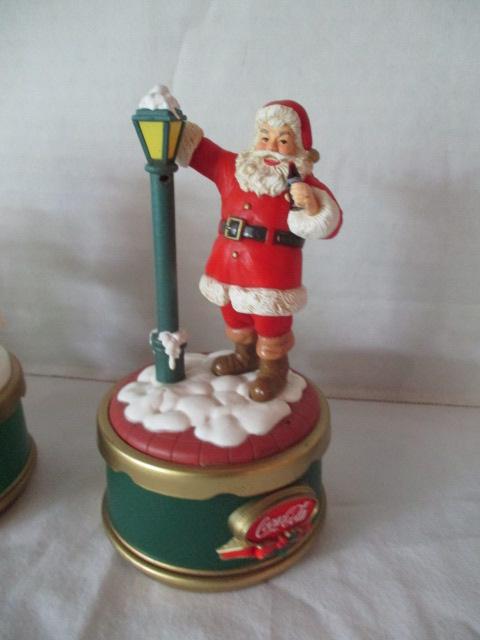 Four Coca-Cola Collection Christmas Music Boxes