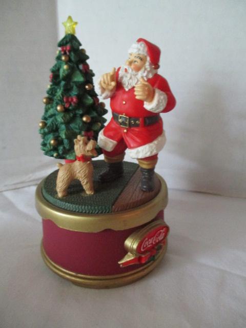 Four Coca-Cola Collection Christmas Music Boxes