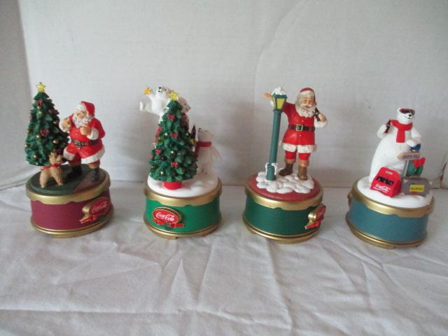 Four Coca-Cola Collection Christmas Music Boxes