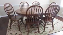 Claw Foot Pedestal Oak Dining Table and Six Windsor Style Spindle Back Side Chairs