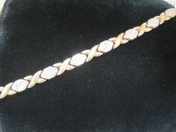 10k Gold "Hugs and Kisses" 7 1/2" Bracelet