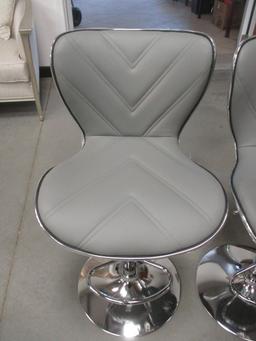 Pair of Grey Faux Leather Adjustable Swivel Bar Chairs