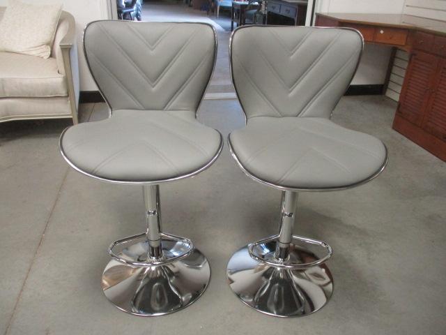 Pair of Grey Faux Leather Adjustable Swivel Bar Chairs