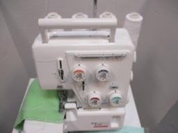 Janome MyLock 134D Differential Feed Serger and Cabinet