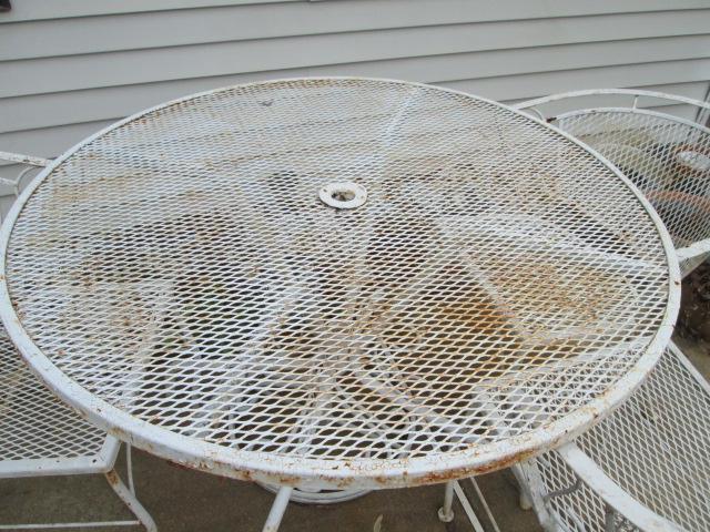 White Wrought Iron Table with Four Chairs