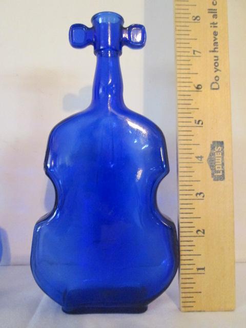 Two Blue Glass Violin Bottles