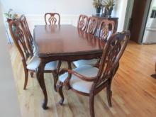 Beautifully Carved Mahogany Finish Dining Table, Armchairs, Side Chairs and Leaves