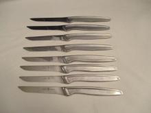 Eight J A Henckels Stainless Knives