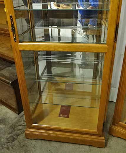 Howard Miller " Collectors Cabinet" Lighted Display. Oak With Beveled Glass Front Panes, Glass Sides