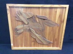 Fantastic framed hand carved wooden pelican. Nice piece of art