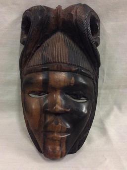 Collection of 4 masks, including an Ironwood from Indonesia and 1 from Philippines