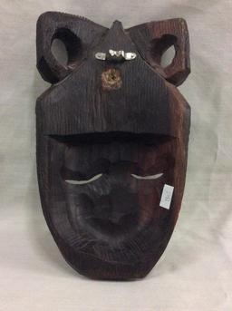 Collection of 4 masks, including an Ironwood from Indonesia and 1 from Philippines