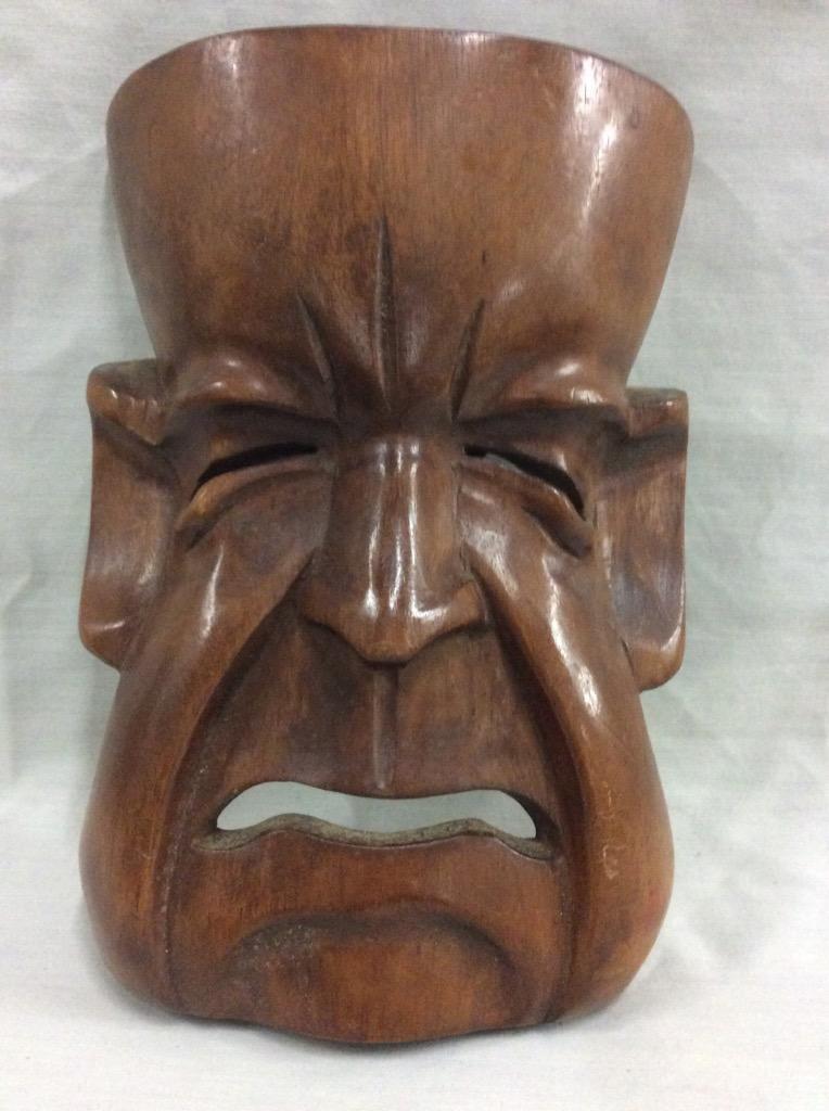 Collection of 4 masks, including an Ironwood from Indonesia and 1 from Philippines