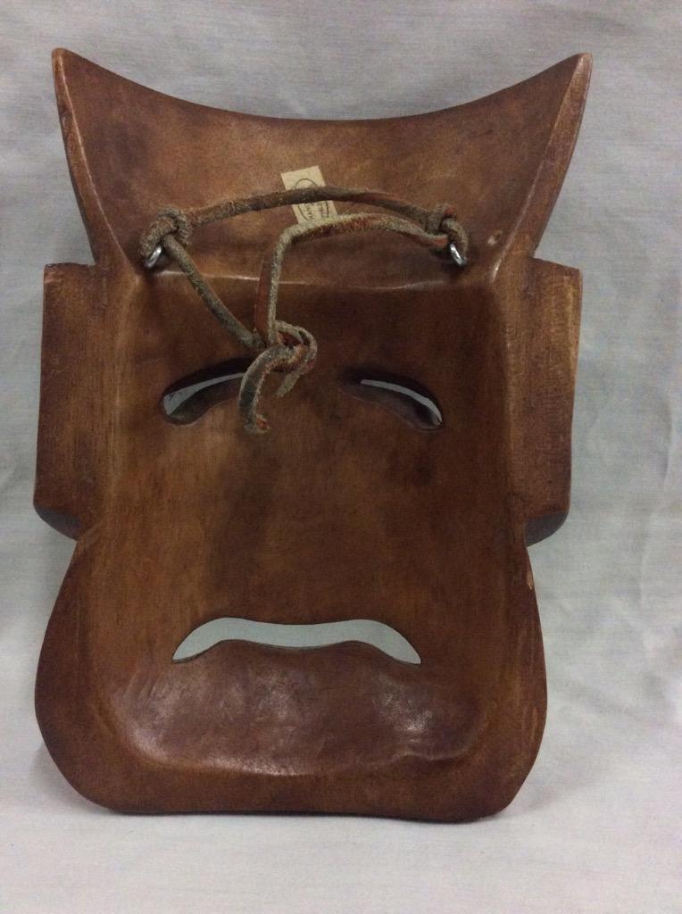 Collection of 4 masks, including an Ironwood from Indonesia and 1 from Philippines