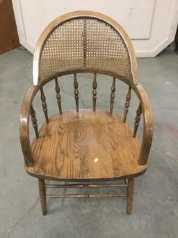 Set of two unique vintage oak spindle back and cane back bent arm dining chairs