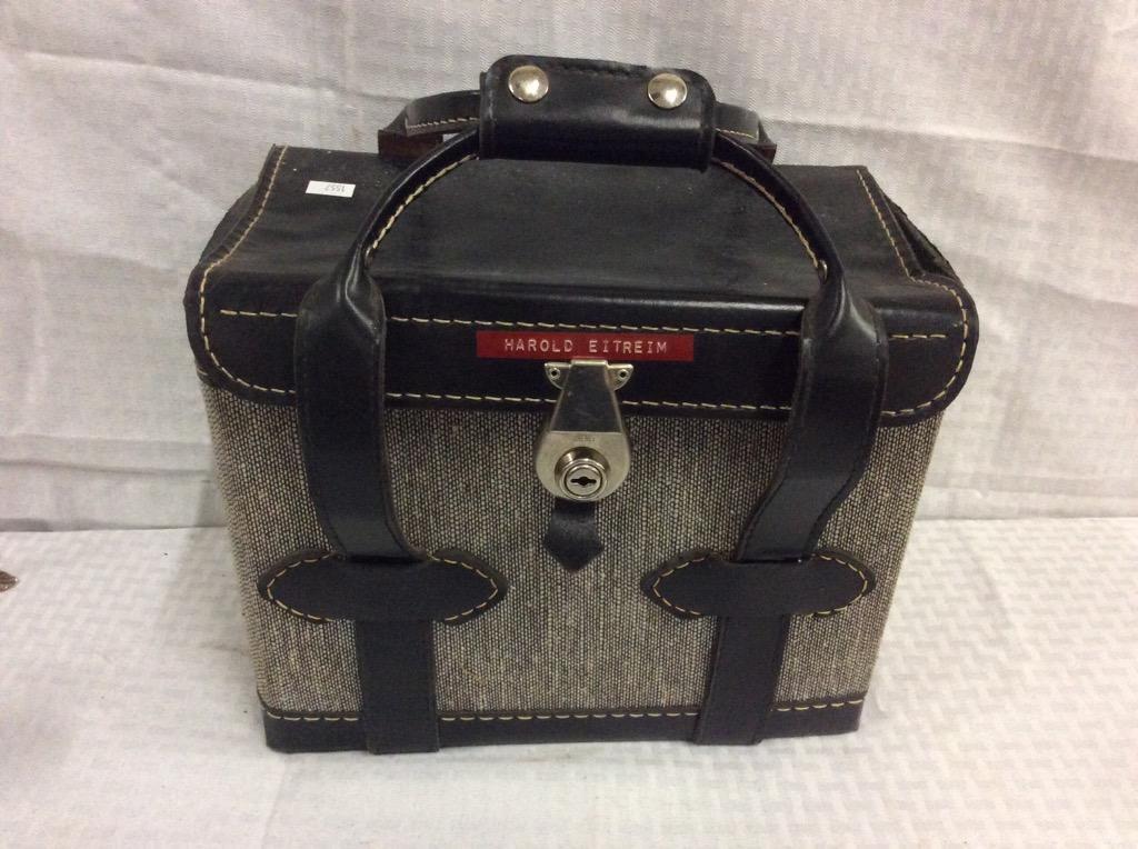 Collection of vintage camera equipment including a brownie target six-16 camera + in a vintage bag