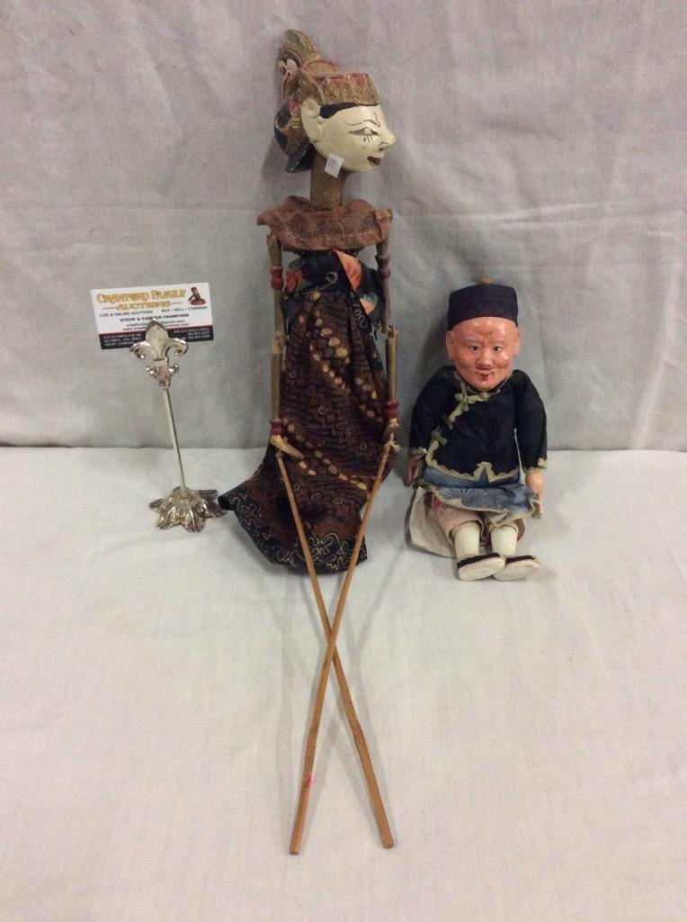 vintage indian hand shadow puppet and asian doll figurine