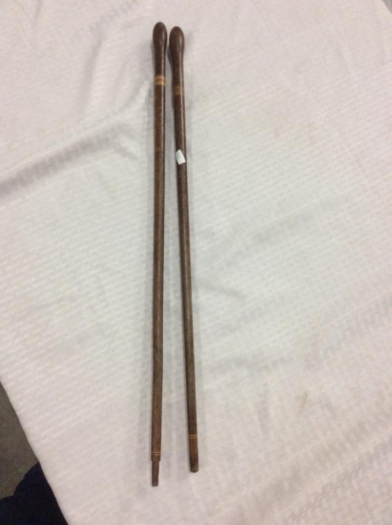 Selection of 2 canes and 2 smaller walking sticks - 3 wood and hand carved + 1 with steel top