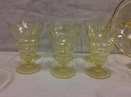 Selection of 26 yellow depression glass items incl glasses, candleholders and a compote