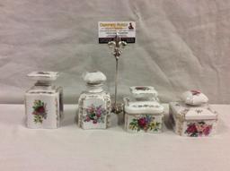 Set of 4 flower porcelain dresser boxes in graduating sizes