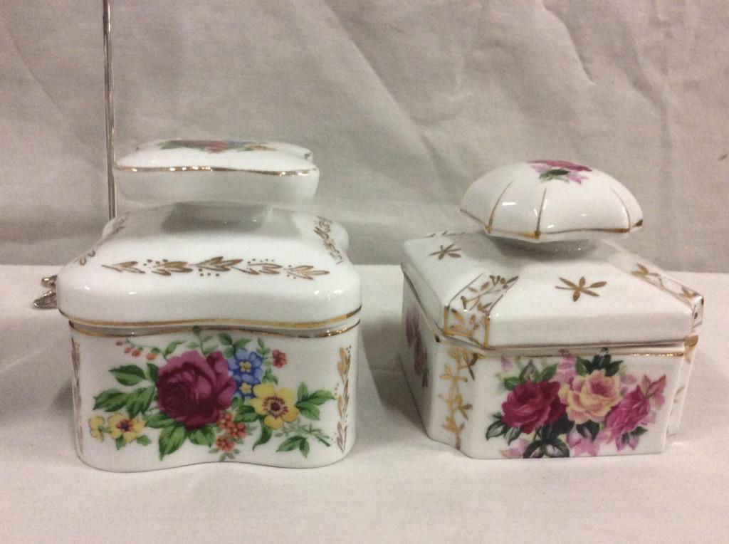 Set of 4 flower porcelain dresser boxes in graduating sizes