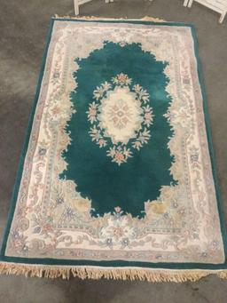 Wool plush rug with fringe and Emerald/Ivory flower design and border as is