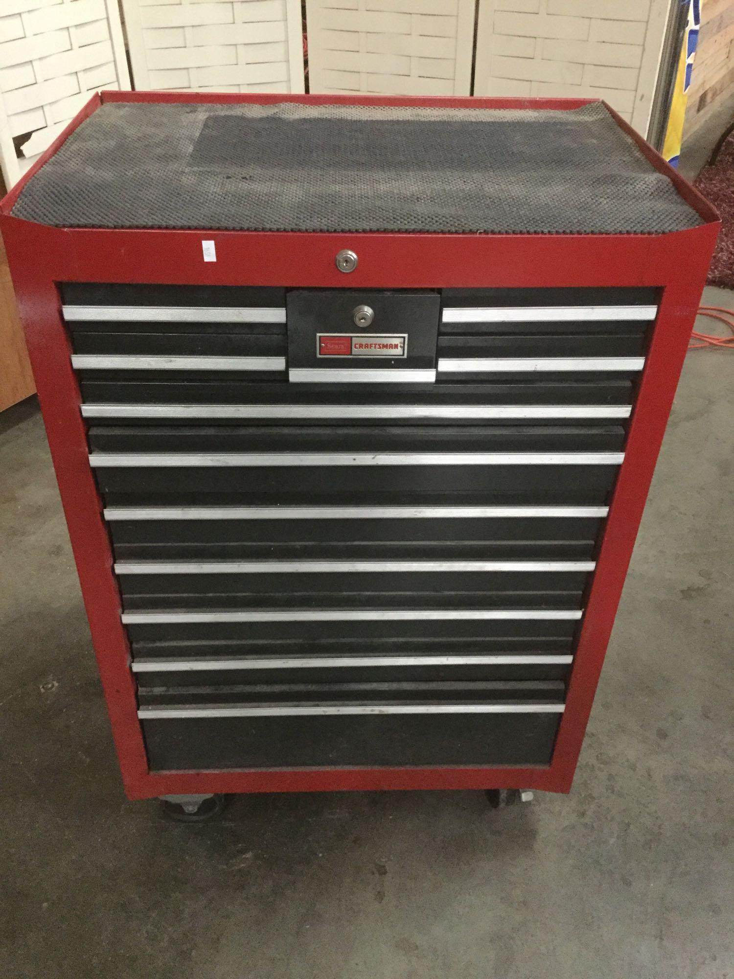 Sears Craftsman rolling tool chest with 12 drawers full of hand tools, hammers and useful shop items