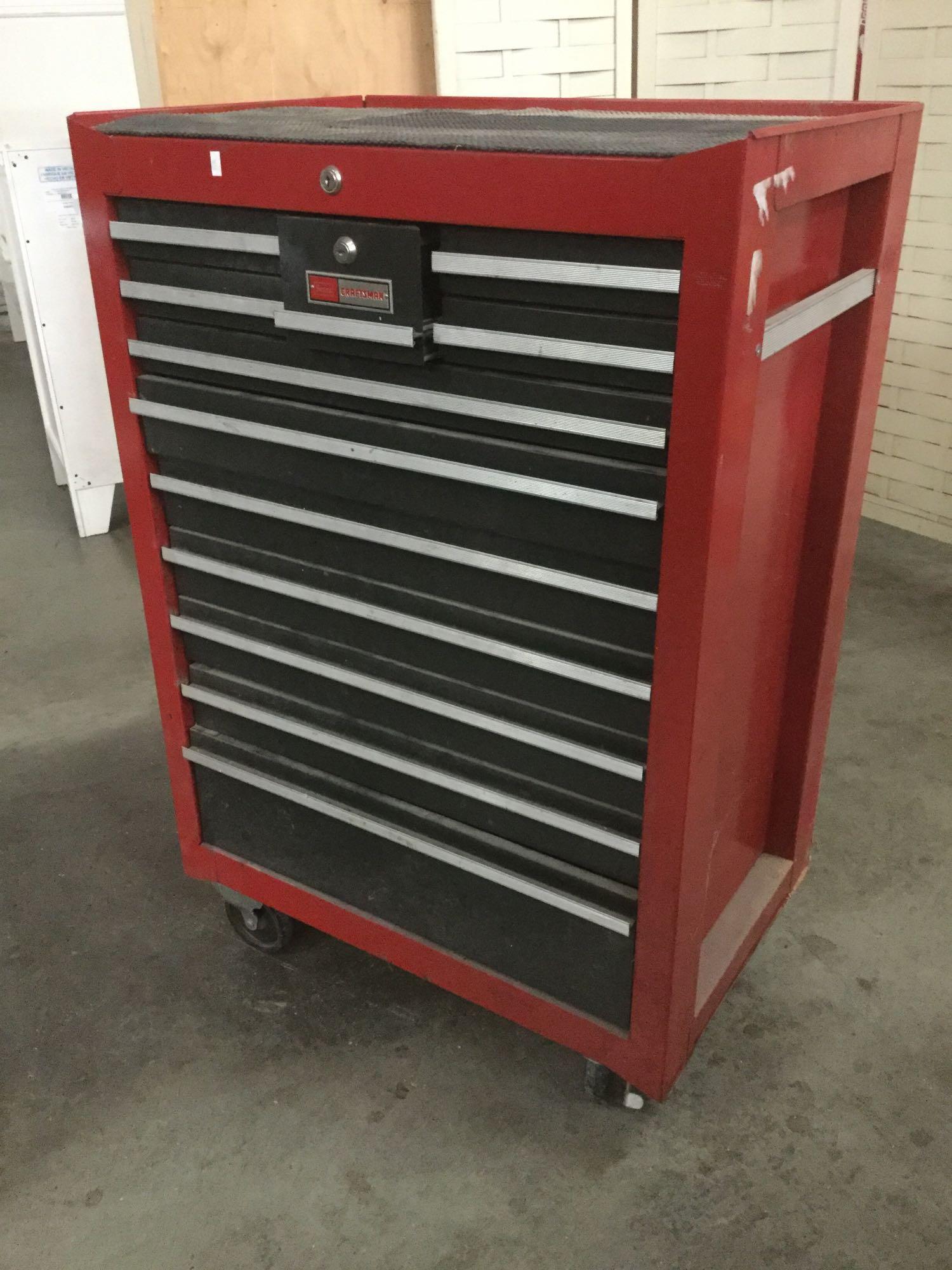 Sears Craftsman rolling tool chest with 12 drawers full of hand tools, hammers and useful shop items