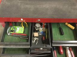 Sears Craftsman rolling tool chest with 12 drawers full of hand tools, hammers and useful shop items