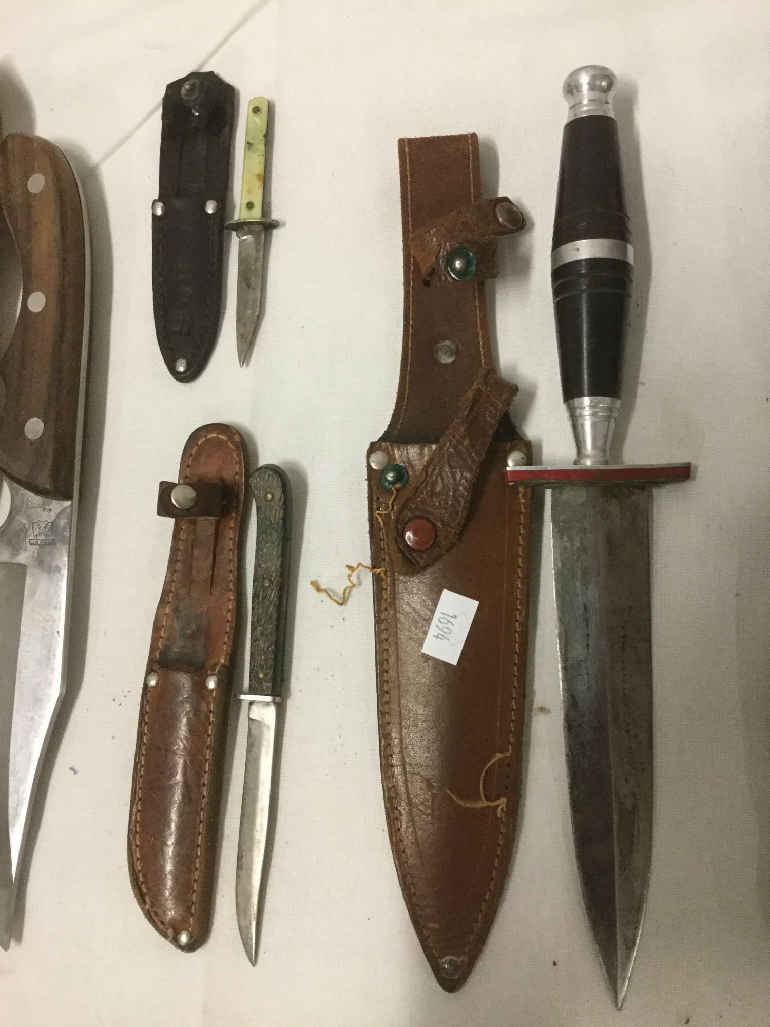 Collection of 10 fixed blade knives w/ sheath, multi-tool w/pouch and an extra sheath - see pics