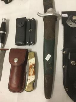 Collection of 10 fixed blade knives w/ sheath, multi-tool w/pouch and an extra sheath - see pics