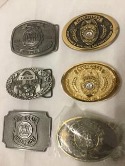 21 metal belt buckles incl. Montana Law, Michigan State Police, Nashville, Crazy Horse etc