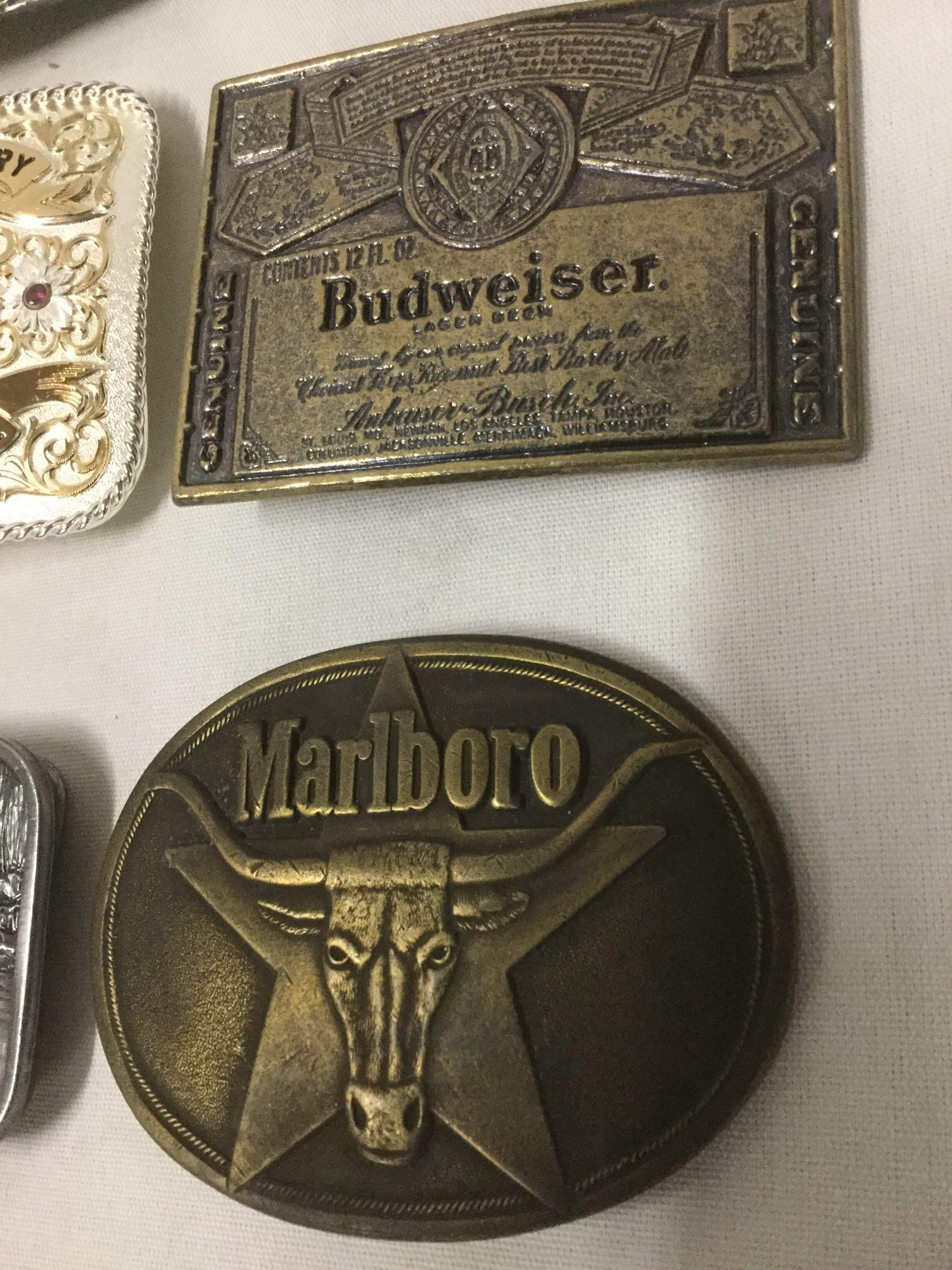 15 metal belt buckles incl. Montana Highway Patrol, Marlboro, Budweiser, etc see desc