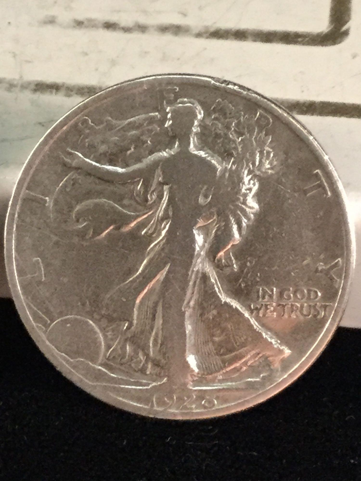 3 silver walking Liberty half dollars, 1917-S, 1918-S, and 1928-S