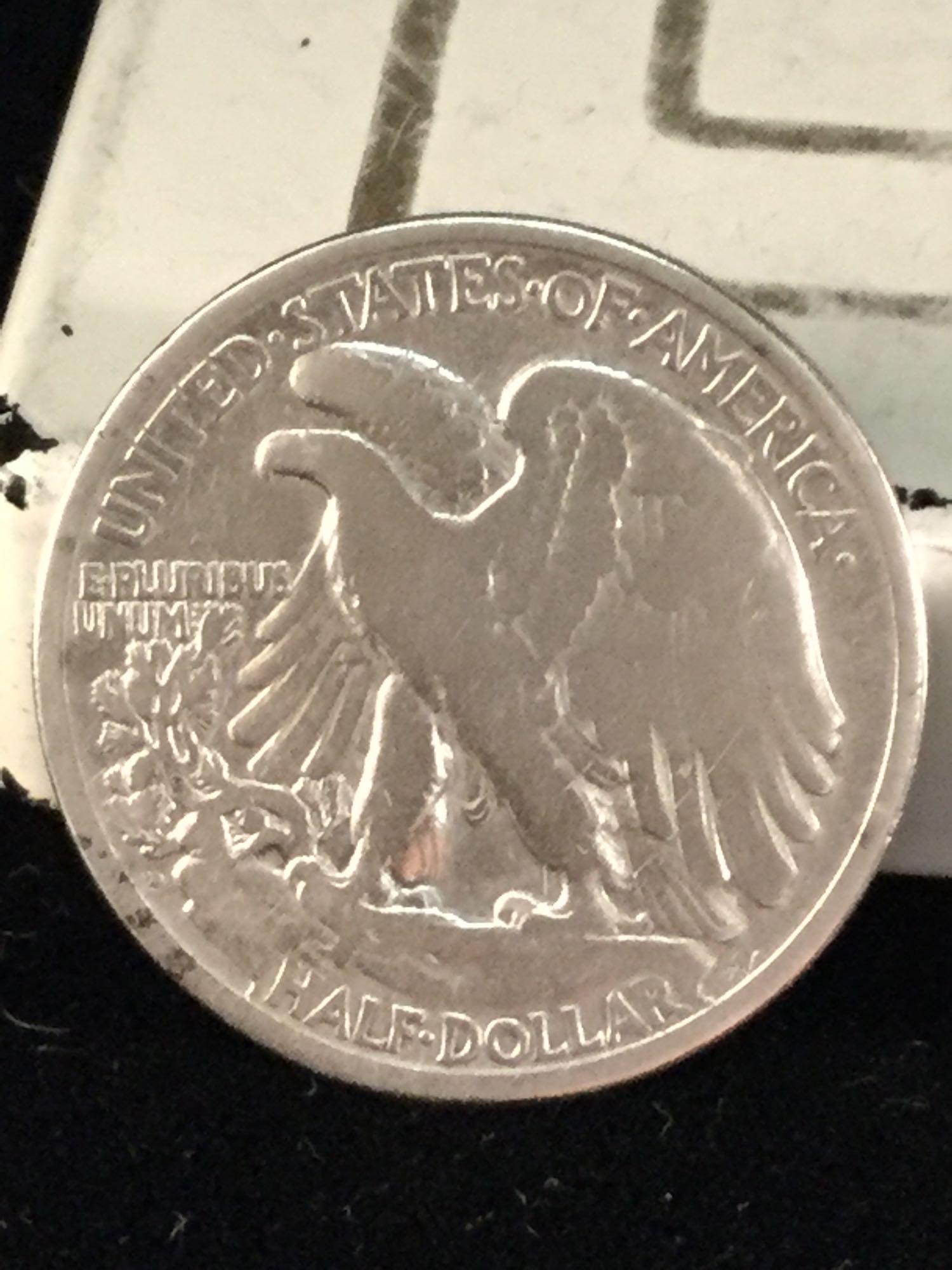 Set of 3 silver Walking Liberty half dollars, 1920-D, 1927-S, and 1943