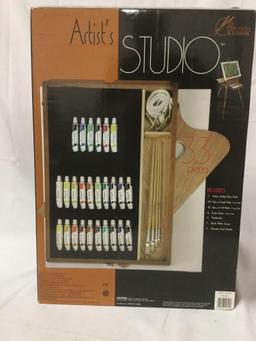Art Studio Classic Artists Studio like new in box, 33 pieces included, portable easel, paints, etc