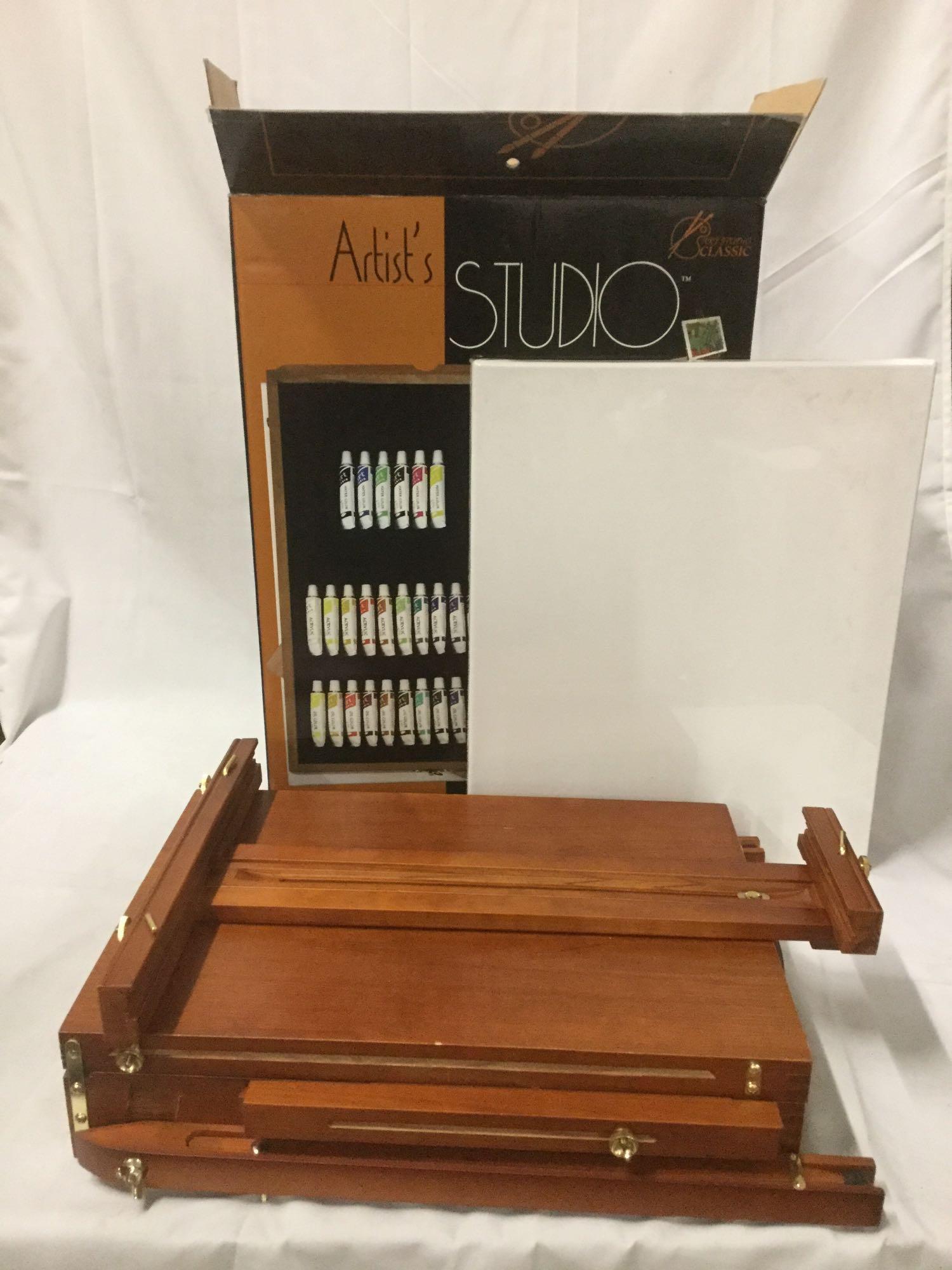 Art Studio Classic Artists Studio like new in box, 33 pieces included, portable easel, paints, etc