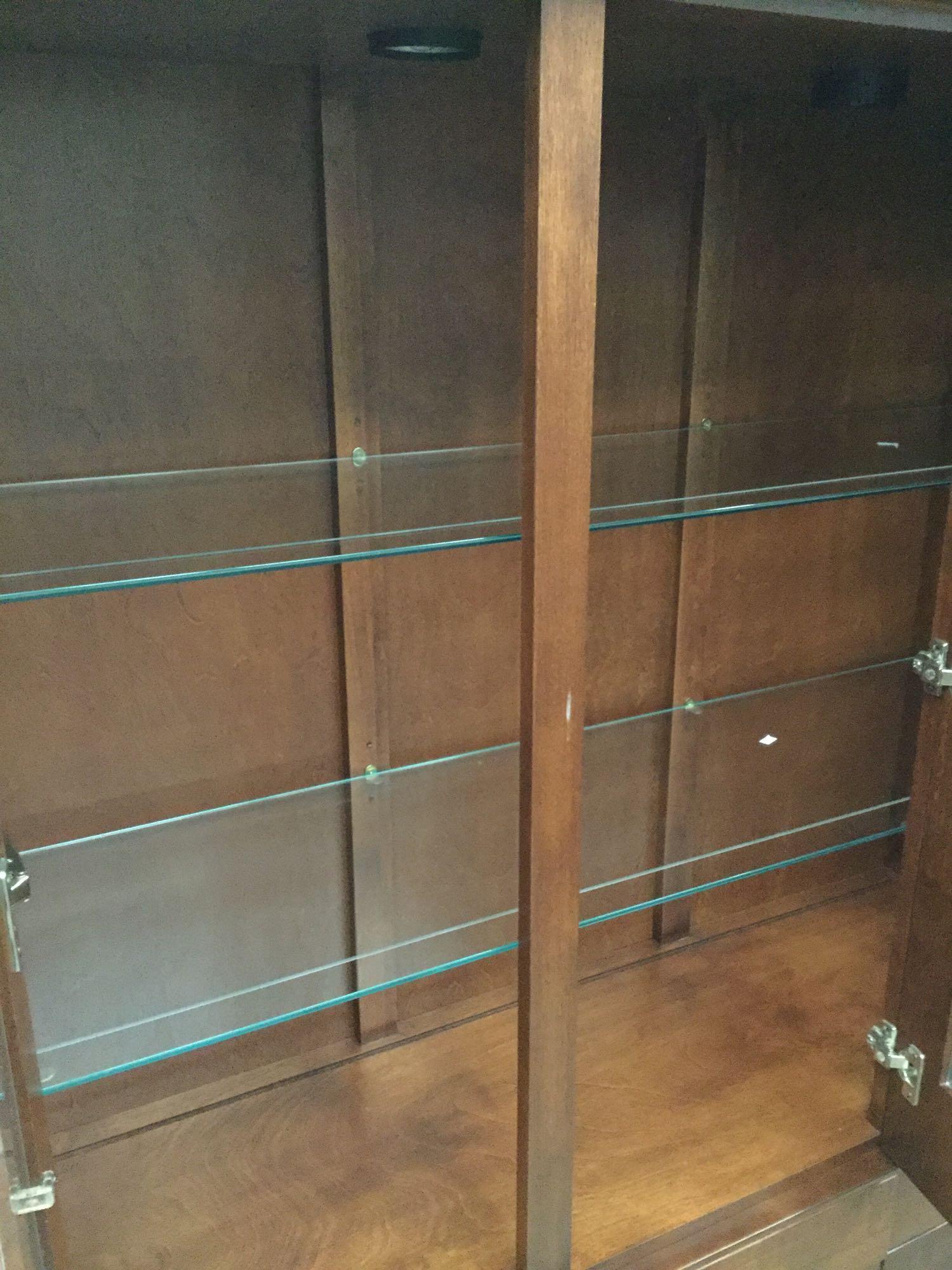 Modern burnished walnut stain china hutch with glass front doors and glass shelves