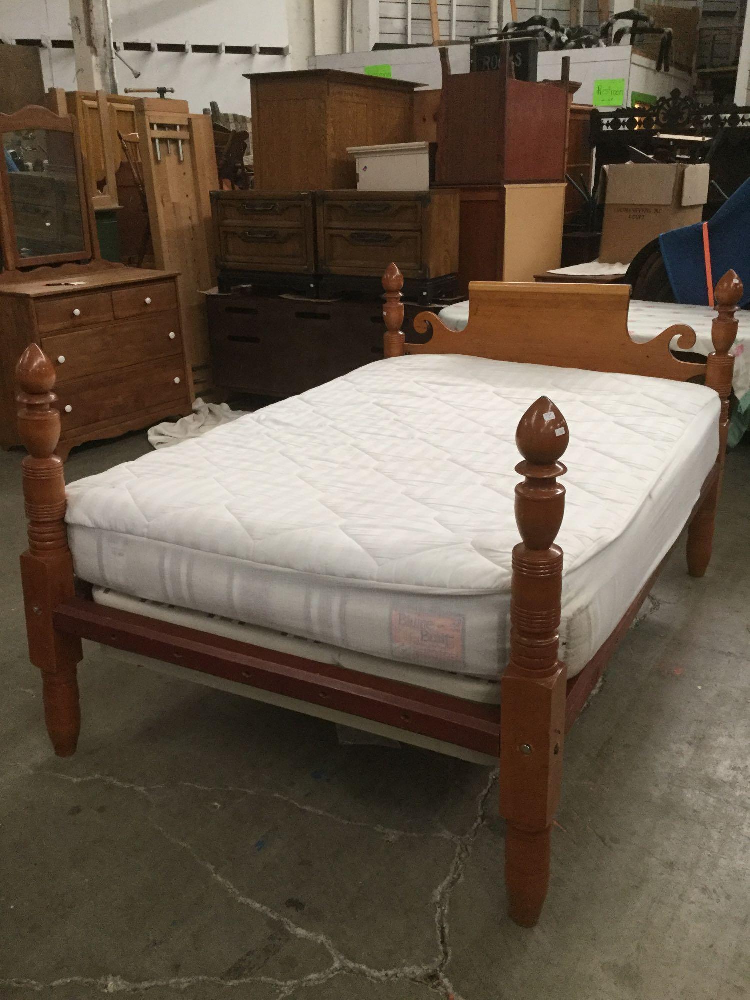 Vintage twin size maple bedframe with turned legs and in fair cond