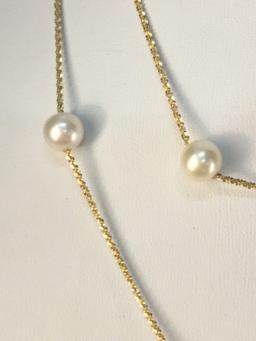 Amazing 14K yellow gold and pearl necklace approx. 23 inches long @ 8.1 grams