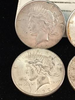 4 silver 1922 and 2 silver 1923 Peace dollars