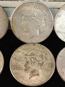 4 silver 1922 and 2 silver 1923 Peace dollars