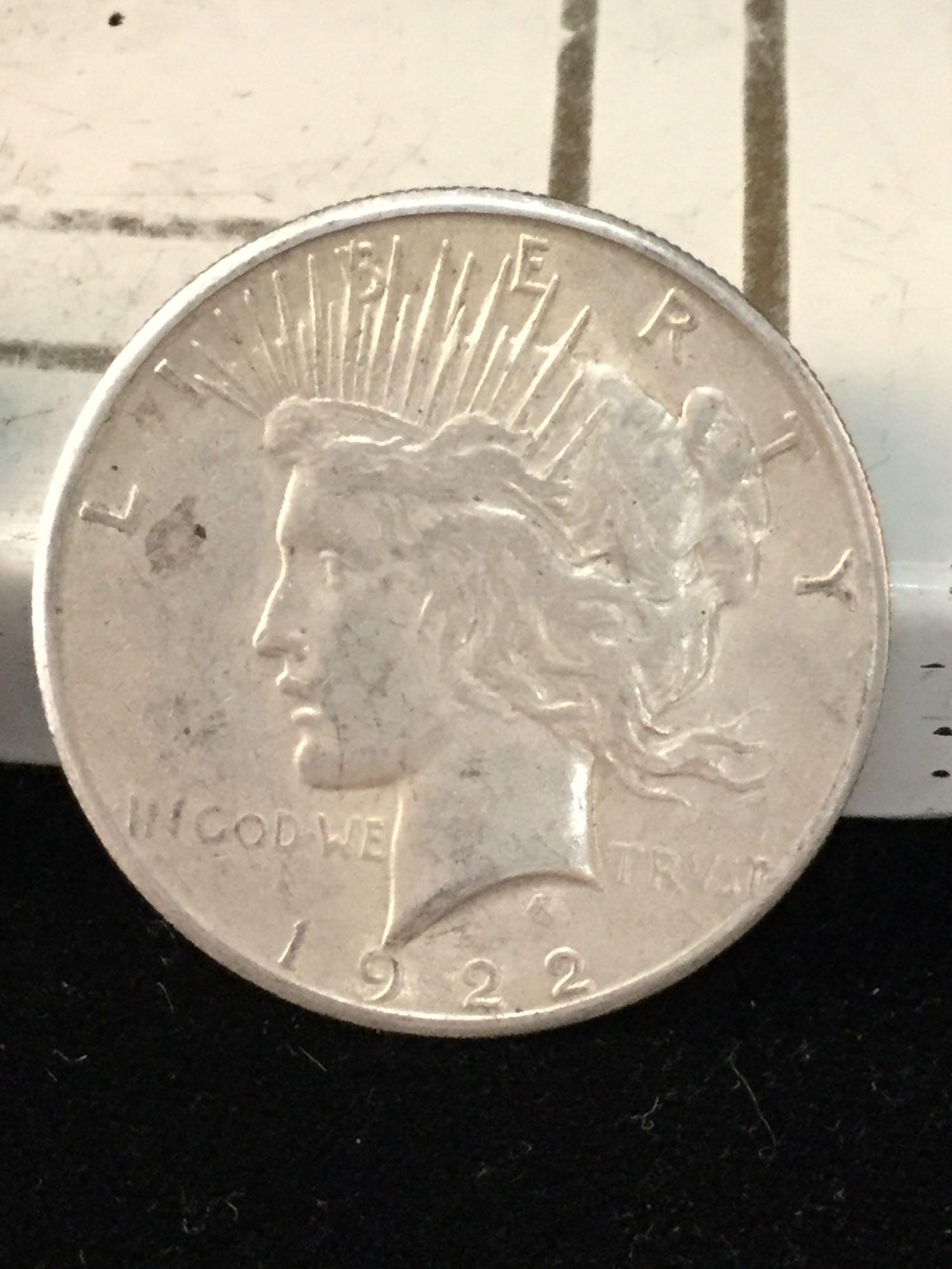 1922 and 2 1922-S silver peace dollars