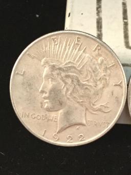 2 1922, a 1923, and a 1926 silver Peace dollars, 4 coins total