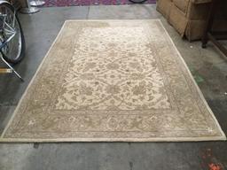 Ivory wool modern machined made area rug with traditional pattern