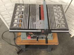 Delta 10 inch Bench Saw , model no. 36-540 Type2, mounted on rolling stand